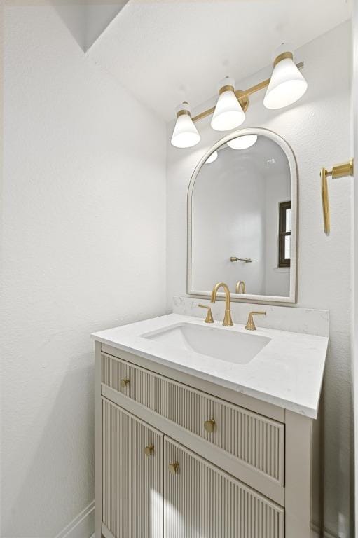322 Mesa Oaks, Leander, TX 78641 - bathroom featuring vanity and baseboards