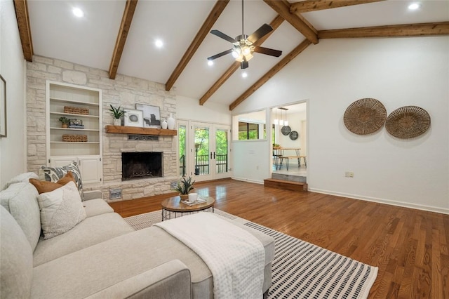 9803 Talleyran Dr, Austin, TX 78750 - living room featuring a fireplace, ceiling fan, beam ceiling, high vaulted ceiling, and baseboards