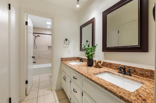 9803 Talleyran Dr, Austin, TX 78750 - bathroom with tile patterned floors, double vanity, and  shower combination
