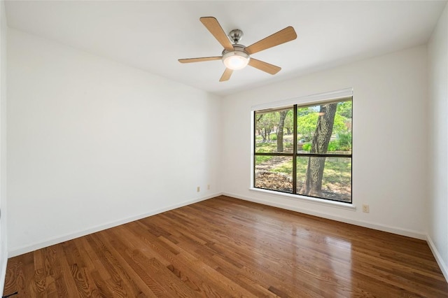 9803 Talleyran Dr, Austin, TX 78750 - empty room with wood finished floors, baseboards, and a ceiling fan