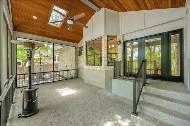 9803 Talleyran Dr, Austin, TX 78750 - unfurnished sunroom featuring french doors, lofted ceiling, healthy amount of natural light, and a skylight