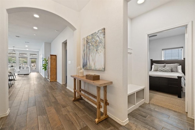 400 Saturnia Dr, Georgetown, TX 78613 - hallway with arched walkways, wood finished floors, recessed lighting, and baseboards