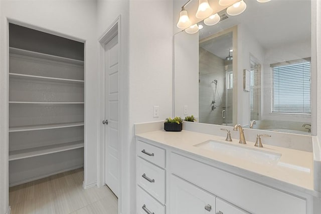 400 Saturnia Dr, Georgetown, TX 78613 - bathroom with vanity, a stall shower, and a garden tub