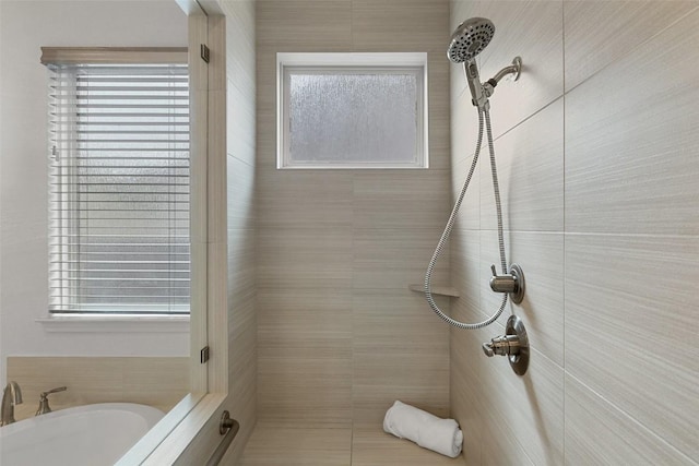 400 Saturnia Dr, Georgetown, TX 78613 - bathroom with a tile shower and a garden tub