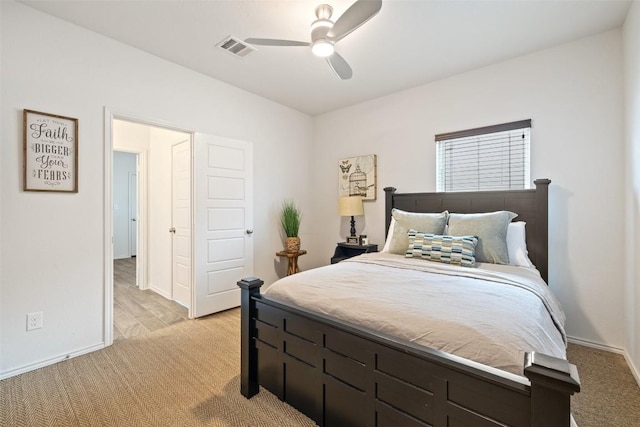 400 Saturnia Dr, Georgetown, TX 78613 - bedroom with baseboards, light carpet, and ceiling fan