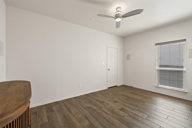 400 Saturnia Dr, Georgetown, TX 78613 - spare room with wood finished floors, a ceiling fan, and baseboards