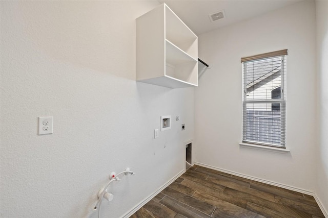 400 Saturnia Dr, Georgetown, TX 78613 - laundry room with gas dryer hookup, hookup for an electric dryer, wood tiled floors, and washer hookup