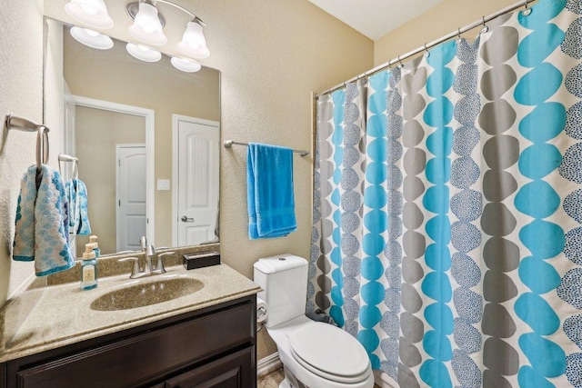 1312 Ravensbrook Bnd, Cedar Park, TX 78613 - bathroom featuring vanity, toilet, and a shower with curtain
