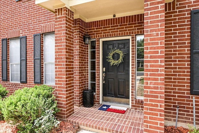 13022 Hunters Chase Dr, Austin, TX 78729 - doorway to property with brick siding