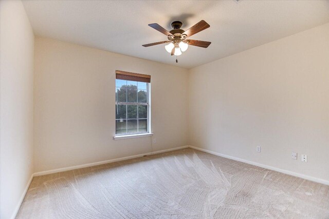 13022 Hunters Chase Dr, Austin, TX 78729 - carpeted empty room featuring baseboards and ceiling fan