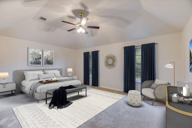 13022 Hunters Chase Dr, Austin, TX 78729 - carpeted bedroom with vaulted ceiling and a ceiling fan