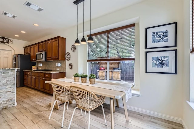 2835 Checker Dr, Cedar Park, TX 78613 - dining room featuring light wood finished floors and recessed lighting