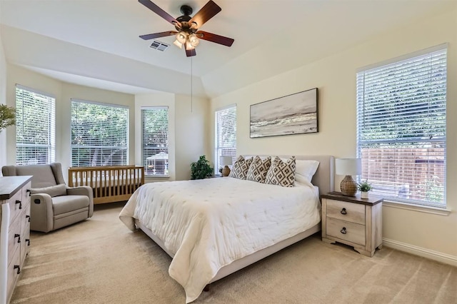 2835 Checker Dr, Cedar Park, TX 78613 - bedroom featuring multiple windows, light carpet, and ceiling fan