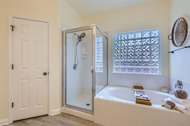 2835 Checker Dr, Cedar Park, TX 78613 - full bath featuring a shower stall, a bath, and wood finished floors