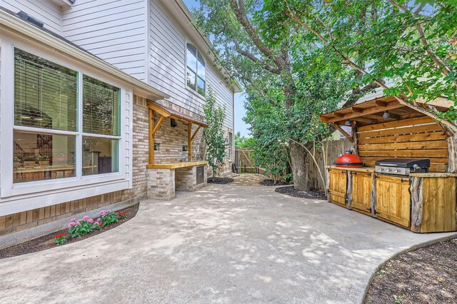 2835 Checker Dr, Cedar Park, TX 78613 - fenced backyard with a grill and a patio