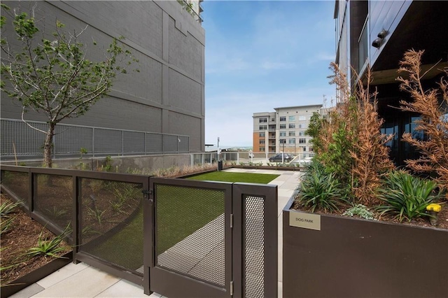 48 E Ave Unit 1210, Austin, TX 78701 - view of home's community featuring a gate
