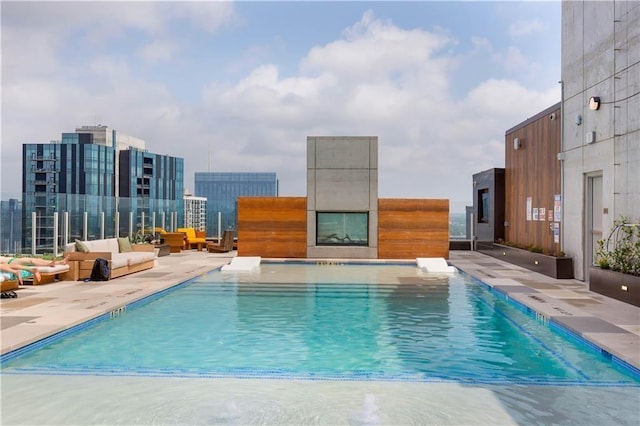48 E Ave Unit 1210, Austin, TX 78701 - community pool featuring a patio and a view of city