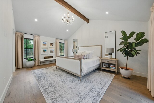 12203 Trailmaster Dr, Austin, TX 78737 - bedroom with beamed ceiling, baseboards, wood finished floors, a chandelier, and high vaulted ceiling