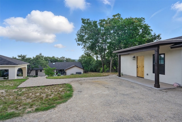 12203 Trailmaster Dr, Austin, TX 78737 - view of yard with driveway