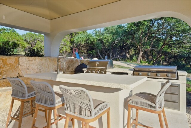 12203 Trailmaster Dr, Austin, TX 78737 - view of patio / terrace featuring view of scattered trees
