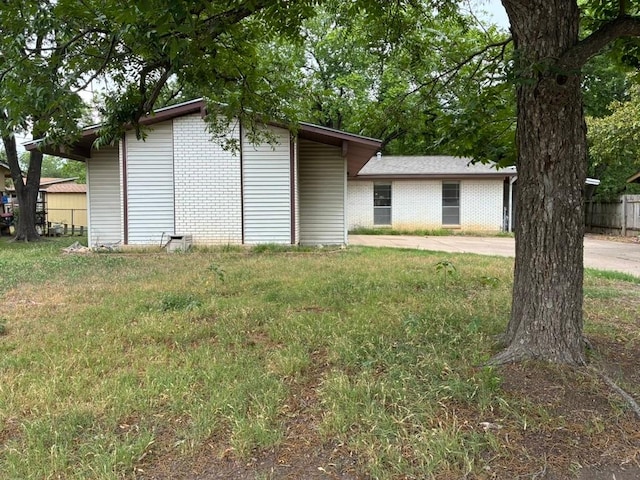 620 Amesbury Ln, Austin, TX 78752 - view of front of home with brick siding