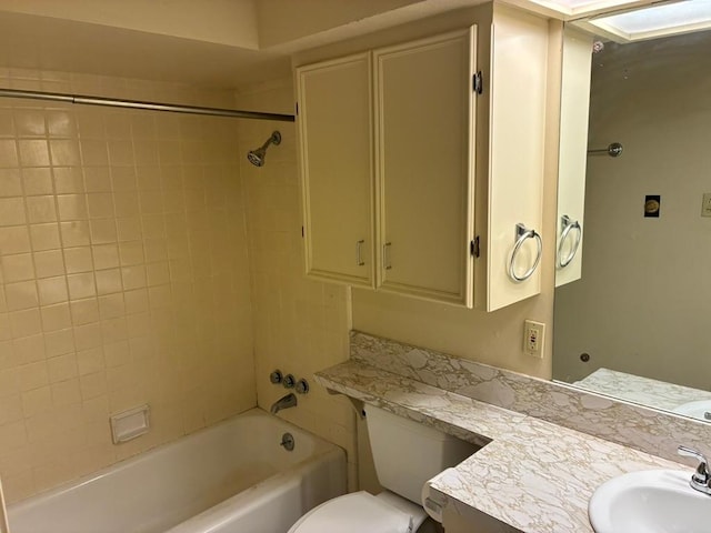 620 Amesbury Ln, Austin, TX 78752 - bathroom featuring tub / shower combination, vanity, and toilet