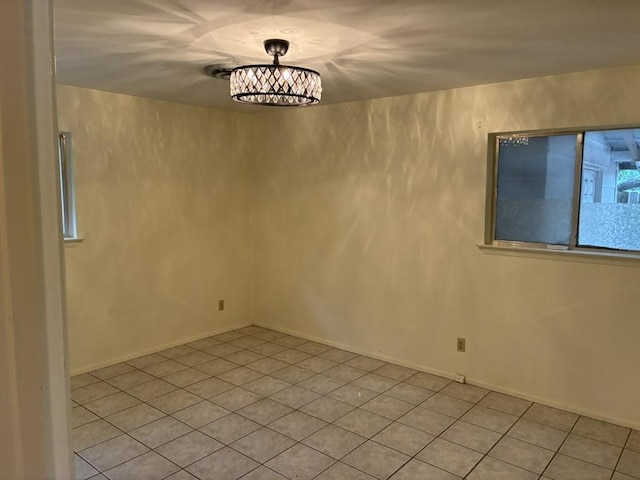 620 Amesbury Ln, Austin, TX 78752 - empty room with light tile patterned flooring