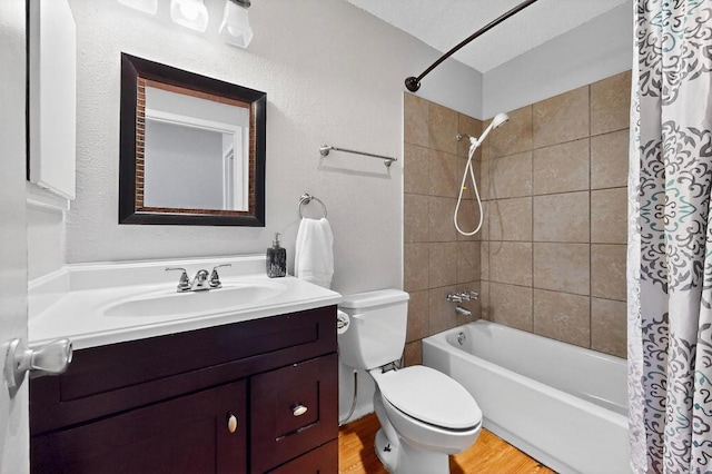 2508 Dovemeadow Dr, Austin, TX 78744 - bathroom featuring shower / tub combo with curtain, vanity, and wood finished floors