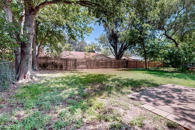 2508 Dovemeadow Dr, Austin, TX 78744 - fenced backyard featuring a patio