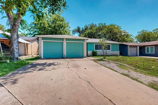 2508 Dovemeadow Dr, Austin, TX 78744 - single story home featuring an attached garage, driveway, and a front lawn