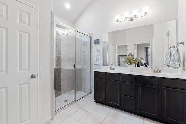 2204 Granite Hill Dr, Leander, TX 78641 - bathroom featuring a shower stall, tile patterned floors, and double vanity