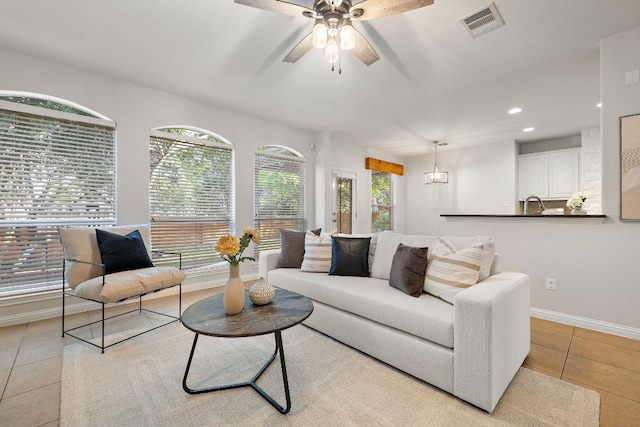 4535 Wandering Vine Trl, Round Rock, TX 78665 - living room featuring tile patterned flooring, ceiling fan, recessed lighting, and baseboards