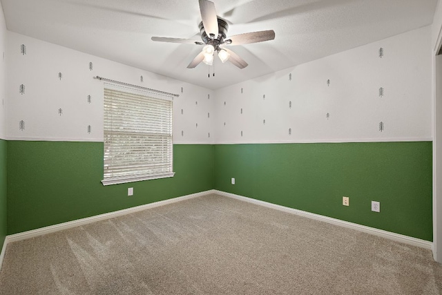 4535 Wandering Vine Trl, Round Rock, TX 78665 - carpeted spare room with ceiling fan and baseboards