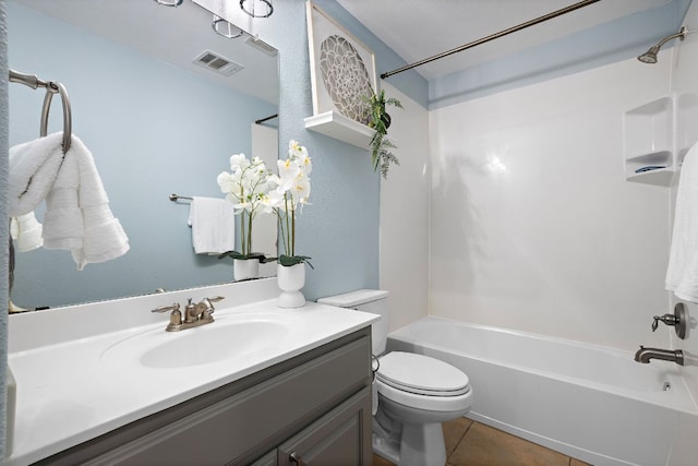 4535 Wandering Vine Trl, Round Rock, TX 78665 - full bathroom featuring washtub / shower combination, vanity, toilet, and tile patterned floors