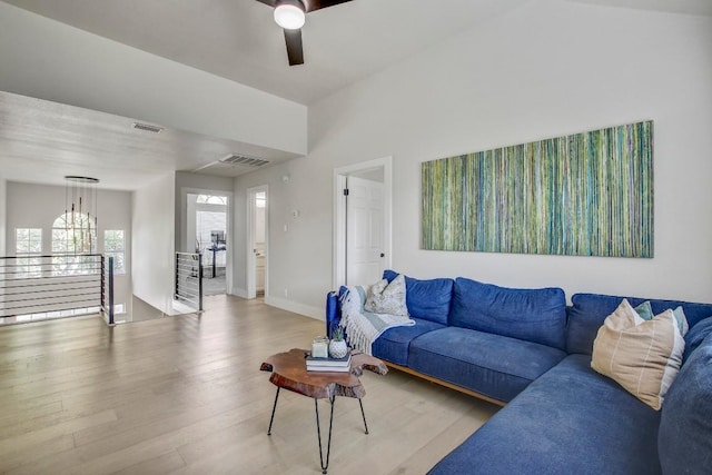10840 Redmond Rd, Austin, TX 78739 - living room with wood finished floors, a ceiling fan, and baseboards