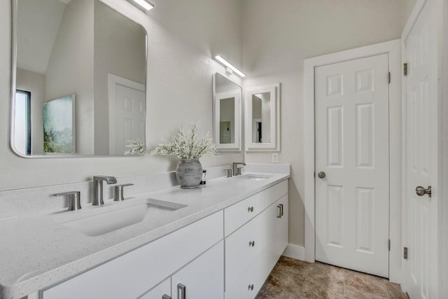 10840 Redmond Rd, Austin, TX 78739 - full bath featuring double vanity and lofted ceiling