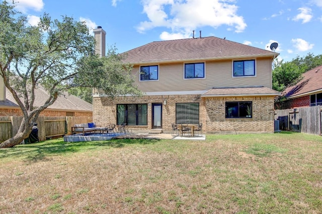 10840 Redmond Rd, Austin, TX 78739 - back of property featuring a chimney, a patio, brick siding, and roof with shingles