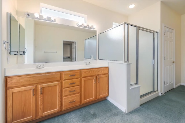 287 Red Poppy Trl, Georgetown, TX 78633 - bathroom featuring carpet flooring, a stall shower, double vanity, and baseboards