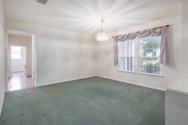 287 Red Poppy Trl, Georgetown, TX 78633 - unfurnished room featuring carpet flooring, a chandelier, and baseboards