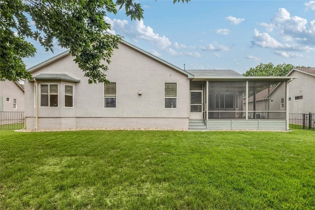 287 Red Poppy Trl, Georgetown, TX 78633 - rear view of house with a sunroom and stucco siding