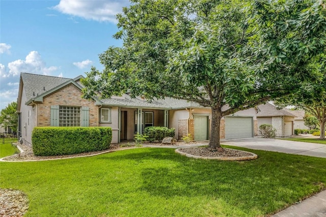 287 Red Poppy Trl, Georgetown, TX 78633 - view of front facade featuring concrete driveway, a front lawn, a garage, and a shingled roof