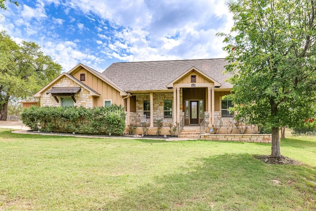 201 Thomas Ridge Rd, Burnet, TX 78611 - craftsman house with board and batten siding, stone siding, a shingled roof, and covered porch
