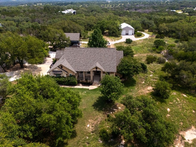 201 Thomas Ridge Rd, Burnet, TX 78611 - aerial view of property and surrounding area with a heavily wooded area