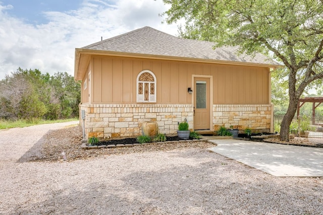 201 Thomas Ridge Rd, Burnet, TX 78611 - view of front of home with stone siding and a shingled roof