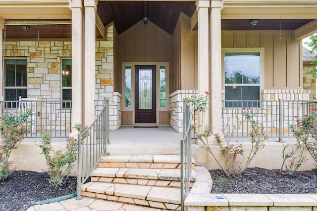 201 Thomas Ridge Rd, Burnet, TX 78611 - view of exterior entry featuring board and batten siding, a porch, and stone siding