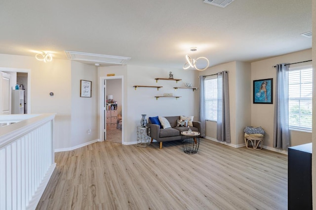 17020 Lathrop Ave, Pflugerville, TX 78660 - sitting room with light wood-style flooring and baseboards