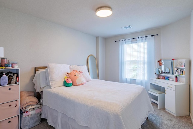 17020 Lathrop Ave, Pflugerville, TX 78660 - bedroom featuring light carpet