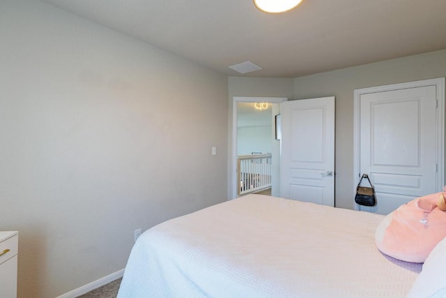 17020 Lathrop Ave, Pflugerville, TX 78660 - carpeted bedroom with baseboards