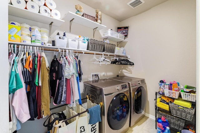 17020 Lathrop Ave, Pflugerville, TX 78660 - laundry area with washing machine and dryer and baseboards