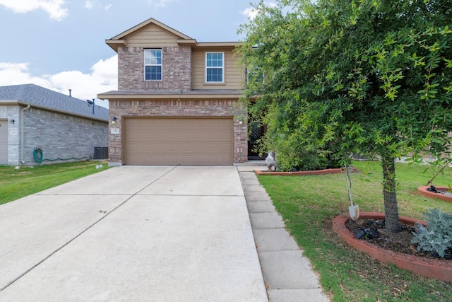 17020 Lathrop Ave, Pflugerville, TX 78660 - view of front of house with brick siding, an attached garage, a front lawn, and concrete driveway